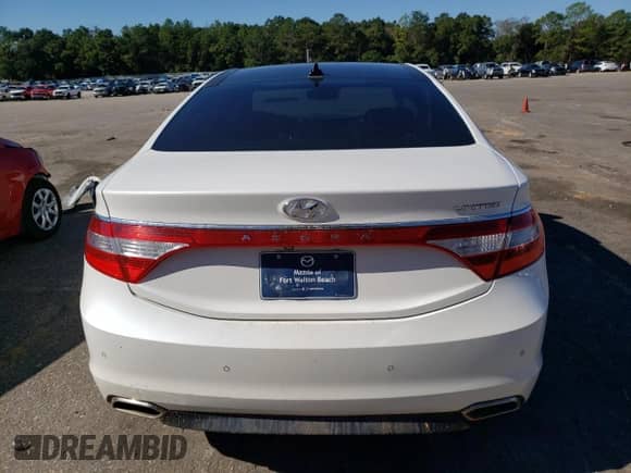 2017 Hyundai Azera Limited с VIN KMHFH4JG0HA581877, выставлен на аукционе Copart как лот 81221514 с пробегом 166 057 миль миль и Списание • Salvage title. История ставок и продаж доступна на DreamBid. Изображение 6.