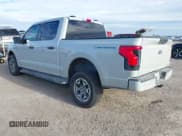 ✅ 2023 Ford F-150 Lightning Pro • VIN: 1FTVW1EL4PWG59817 • Лот: 41243052. Опубликован ранее на IAAI с пробегом 9 859 миль. Бесплатный доступ к архиву аукционных продаж из США и подробный отчёт об истории автомобиля на DreamBid. Изображение 3.