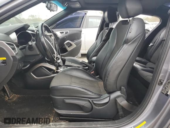 ✅ 2016 Hyundai Veloster • VIN: KMHTC6AD8GU297820 • Lot: 78581324. Wystawiony na Copart z przebiegiem 117 873 mil. Bezpłatny archiwum sprzedaży aukcyjnych z USA i szczegółowy raport historii pojazdu na DreamBid. Zdjęcie 7.