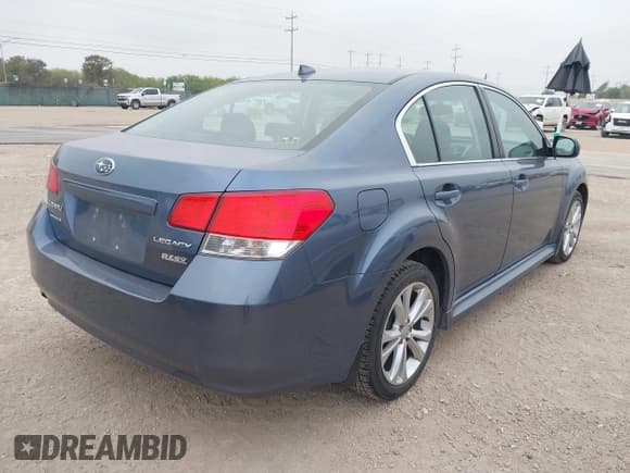 ✅ 2014 Subaru Legacy Premium • VIN: 4S3BMBC63E3015574 • Lot: 43730569. Listed on IAAI with 142,426 mi. Free auction sales archive from the USA and detailed vehicle history report at DreamBid. Image 4.