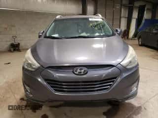 2015 Hyundai Tucson SE z VIN KM8JU3AG1FU973407, wystawiony jako Copart lot #59017604 z przebiegiem Nie podano mil oraz Szkoda całkowita • Salvage title. Historia ofert i sprzedaży dostępna na DreamBid. Obrazek 5.