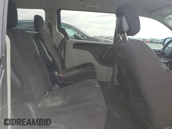 2012 Dodge Grand Caravan SXT z VIN 2C4RDGCG9CR198584, wystawiony jako Copart lot #87287765 z przebiegiem 189 694 mil mil oraz Szkoda całkowita • Salvage title. Historia ofert i sprzedaży dostępna na DreamBid. Obrazek 11.