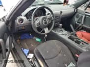 ✅ 2010 Mazda MX-5 Miata Touring • VIN: JM1NC2EF0A0209035 • Lot: 63233614. Wystawiony na Copart z przebiegiem 62 702 mil. Bezpłatny archiwum sprzedaży aukcyjnych z USA i szczegółowy raport historii pojazdu na DreamBid. Zdjęcie 8.