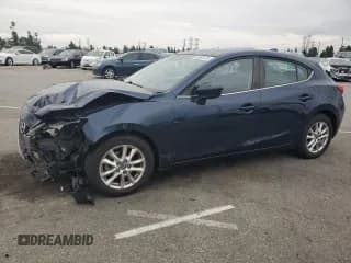 ✅ 2015 Mazda 3 i Touring • VIN: 3MZBM1L78FM162909 • Lot: 93982635. Listed on Copart with 142,605 mi. Free auction sales archive from the USA and detailed vehicle history report at DreamBid. Image 1.