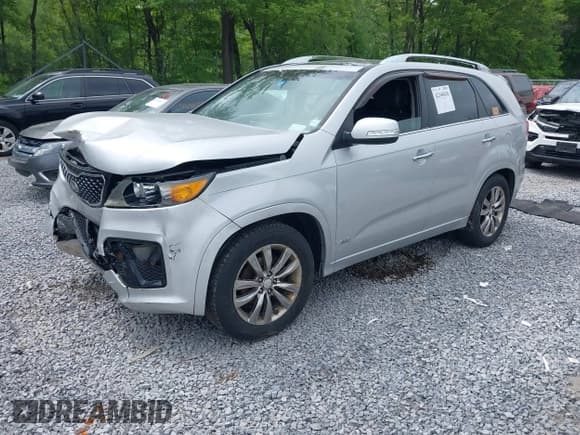 ✅ 2013 Kia Sorento SX • VIN: 5XYKWDA2XDG362271 • Lot: 42340426. Listed on IAAI with 94,459 mi. Free auction sales archive from the USA and detailed vehicle history report at DreamBid. Image 2.