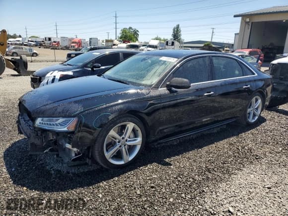 ✅ 2018 Audi A8 • VIN: WAU44AFD4JN000803 • Лот: 62789975. Опубликован ранее на Copart с пробегом 79 729 миль. Бесплатный доступ к архиву аукционных продаж из США и подробный отчёт об истории автомобиля на DreamBid. Изображение 1.