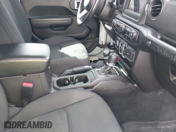 ✅ 2023 Jeep Wrangler • VIN: 1C4JJXN63PW625829 • Lot: 42256900. Wystawiony na IAAI z przebiegiem 20 501 mil. Bezpłatny archiwum sprzedaży aukcyjnych z USA i szczegółowy raport historii pojazdu na DreamBid. Zdjęcie 5.