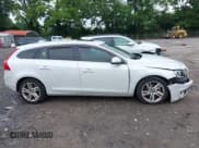 ✅ 2015 Volvo V60 T5 Drive-E Premier • VIN: YV140MEB8F1188282 • Lot: 42507317. Wystawiony na IAAI z przebiegiem 130 000 mil. Bezpłatny archiwum sprzedaży aukcyjnych z USA i szczegółowy raport historii pojazdu na DreamBid. Zdjęcie 14.