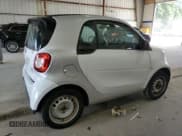✅ 2016 Smart fortwo Passion • VIN: WMEFJ5DA2GK139148 • Lot: 70122315. Wystawiony na Copart z przebiegiem 59 684 mil. Bezpłatny archiwum sprzedaży aukcyjnych z USA i szczegółowy raport historii pojazdu na DreamBid. Zdjęcie 3.