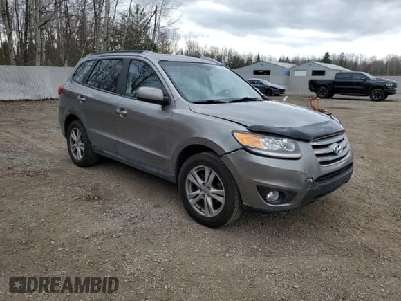 ✅ 2012 Hyundai Santa Fe Limited • VIN: 5XYZHDAG6CG149305 • Lot: 79016974. Listed on Copart with 268,224 mi. Free auction sales archive from the USA and detailed vehicle history report at DreamBid. Image 4.