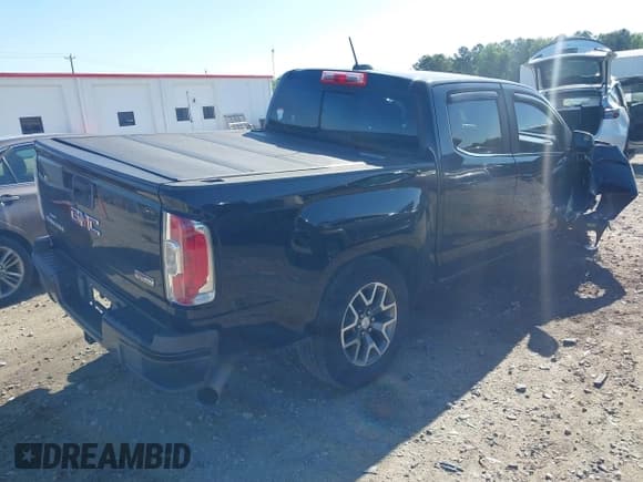 ✅ 2016 GMC Canyon 4WD SLE • VIN: 1GTP6CE10G1365458 • Lot: 42114141. Listed on IAAI with 117,488 mi. Free auction sales archive from the USA and detailed vehicle history report at DreamBid. Image 4.