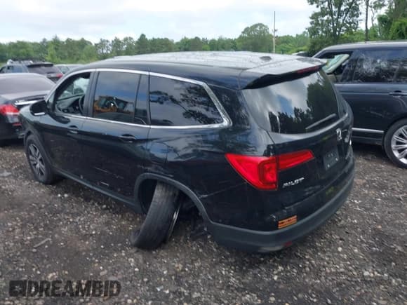 ✅ 2017 Honda Pilot EX-L • VIN: 5FNYF6H56HB048961 • Lot: 42664011. Listed on IAAI with 210,063 mi. Free auction sales archive from the USA and detailed vehicle history report at DreamBid. Image 14.