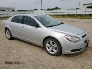 ✅ 2011 Chevrolet Malibu 1LS • VIN: 1G1ZB5E14BF326151 • Lot: 67765654. Listed on Copart with 144,910 mi. Free auction sales archive from the USA and detailed vehicle history report at DreamBid. Image 4.