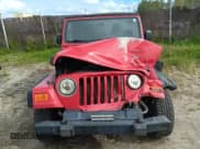 ✅ 2005 Jeep Wrangler Unlimited • VIN: 1J4FA44S15P312587 • Lot: 68176985. Listed on Copart with 186,612 mi. Free auction sales archive from the USA and detailed vehicle history report at DreamBid. Image 5.