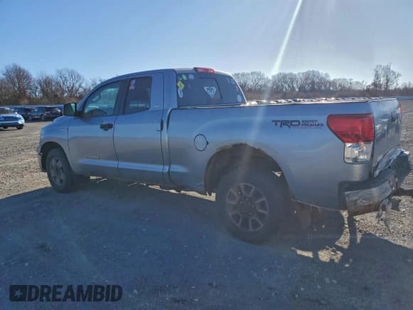 ✅ 2013 Toyota Tundra • VIN: 5TFUY5F15DX279367 • Lot: 94982165. Listed on Copart with 103,351 mi. Free auction sales archive from the USA and detailed vehicle history report at DreamBid. Image 2.