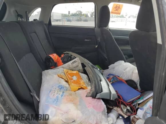 2020 Mitsubishi Outlander ES z VIN JA4AP3AU3LU027400, wystawiony jako Copart lot #87098085 z przebiegiem 92 379 mil mil oraz Czysty tytuł • Clean title. Historia ofert i sprzedaży dostępna na DreamBid. Obrazek 11.