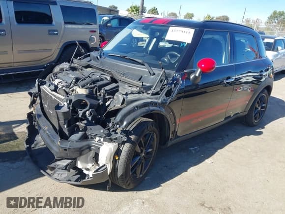 ✅ 2014 MINI Countryman S • VIN: WMWZC3C52EWP25527 • Lot: 43770115. Listed on IAAI with 136,456 mi. Free auction sales archive from the USA and detailed vehicle history report at DreamBid. Image 2.