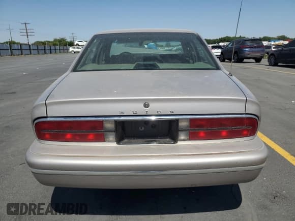✅ 1996 Buick Park Avenue • VIN: 1G4CW52K6TH628072 • Lot: 63138295. Wystawiony na Copart z przebiegiem 102 414 mil. Bezpłatny archiwum sprzedaży aukcyjnych z USA i szczegółowy raport historii pojazdu na DreamBid. Zdjęcie 6.