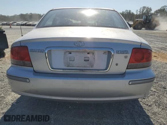 2004 Hyundai Sonata GLS z VIN KMHWF35H04A052801, wystawiony jako Copart lot #75386264 z przebiegiem 166 758 mil mil oraz Szkoda całkowita • Salvage title. Historia ofert i sprzedaży dostępna na DreamBid. Obrazek 6.