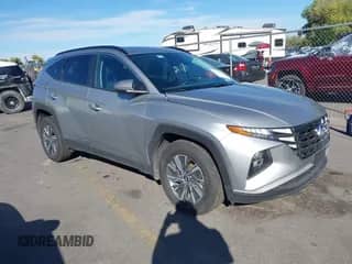 2024 Hyundai Tucson Blue z VIN KM8JBCD14RU209729, wystawiony jako IAAI lot #43321625 z przebiegiem 13 661 mil mil oraz . Historia ofert i sprzedaży dostępna na DreamBid. Obrazek 1.