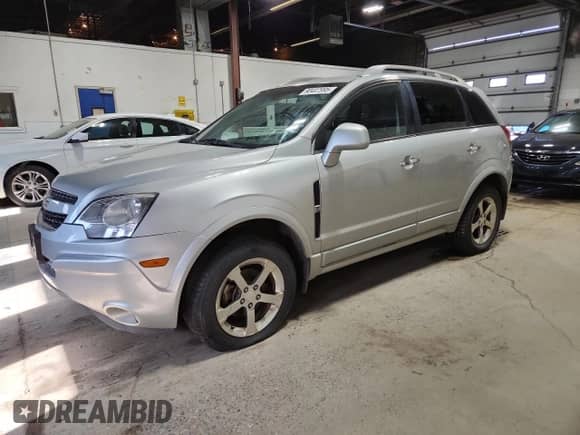 2012 Chevrolet Captiva Sport LTZ with VIN 3GNFL4E59CS592869, listed as a Copart auction lot 90407995 with 174,518 mi miles and Clean title. Bid and sale history available at DreamBid. Image 1.