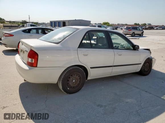 ✅ 2000 Mazda Protege DX • VIN: JM1BJ2228Y0230266 • Lot: 67923345. Wystawiony na Copart z przebiegiem 132 441 mil. Bezpłatny archiwum sprzedaży aukcyjnych z USA i szczegółowy raport historii pojazdu na DreamBid. Zdjęcie 3.