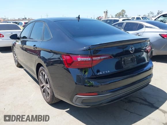✅ 2023 Volkswagen Jetta Sport • VIN: 3VWBM7BU1PM041957 • Lot: 42293989. Listed on IAAI with 31,737 mi. Free auction sales archive from the USA and detailed vehicle history report at DreamBid. Image 3.