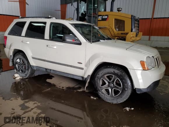 ✅ 2010 Jeep Grand Cherokee Laredo • VIN: 1J4PR4GK0AC124959 • Lot: 82571174. Wystawiony na Copart z przebiegiem 211 365 mil. Bezpłatny archiwum sprzedaży aukcyjnych z USA i szczegółowy raport historii pojazdu na DreamBid. Zdjęcie 4.