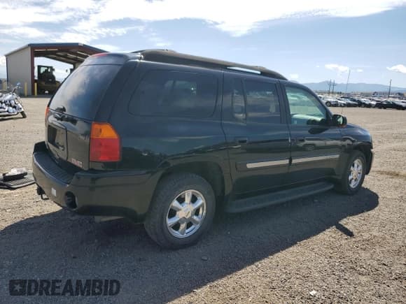 ✅ 2005 GMC Envoy SLT • VIN: 1GKET16S056174980 • Lot: 65994695. Listed on Copart with 140,649 mi. Free auction sales archive from the USA and detailed vehicle history report at DreamBid. Image 3.
