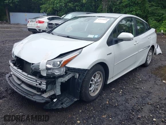 ✅ 2022 Toyota Prius L Eco • VIN: JTDKAMFU2N3167148 • Lot: 42534666. Listed on IAAI with 92,890 mi. Free auction sales archive from the USA and detailed vehicle history report at DreamBid. Image 2.