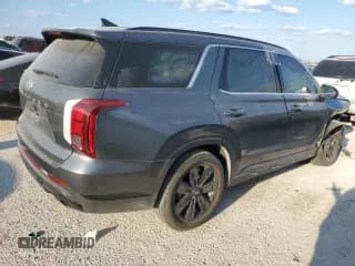 ✅ 2023 Hyundai Palisade XRT • VIN: KM8R34GEXPU627133 • Лот: 74374144. Опубликован ранее на Copart с пробегом Не указан. Бесплатный доступ к архиву аукционных продаж из США и подробный отчёт об истории автомобиля на DreamBid. Изображение 3.