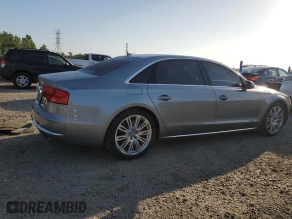 ✅ 2012 Audi A8 • VIN: WAURVAFD2CN016861 • Lot: 52667165. Listed on Copart with 101,793 mi. Free auction sales archive from the USA and detailed vehicle history report at DreamBid. Image 3.