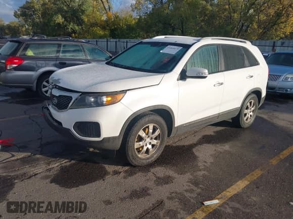 ✅ 2013 Kia Sorento LX • VIN: 5XYKT4A20DG315050 • Lot: 43465879. Listed on IAAI with 159,623 mi. Free auction sales archive from the USA and detailed vehicle history report at DreamBid. Image 2.