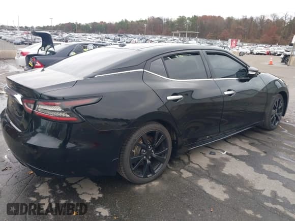 ✅ 2017 Nissan Maxima Platinum • VIN: 1N4AA6AP0HC423399 • Lot: 43671292. Listed on IAAI with 91,433 mi. Free auction sales archive from the USA and detailed vehicle history report at DreamBid. Image 4.