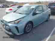 2021 Toyota Prius L Eco with VIN JTDKAMFU6M3127489, listed as a IAAI auction lot 42046658 with 126,249 mi miles and . Bid and sale history available at DreamBid. Image 2.