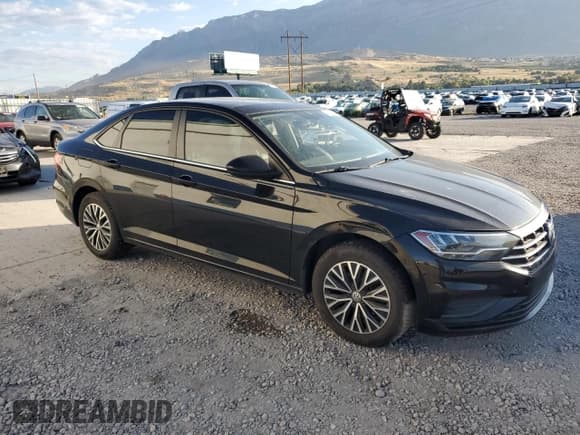 ✅ 2019 Volkswagen Jetta S • VIN: 3VWC57BU5KM025027 • Lot: 80621505. Listed on Copart with 87,390 mi. Free auction sales archive from the USA and detailed vehicle history report at DreamBid. Image 4.