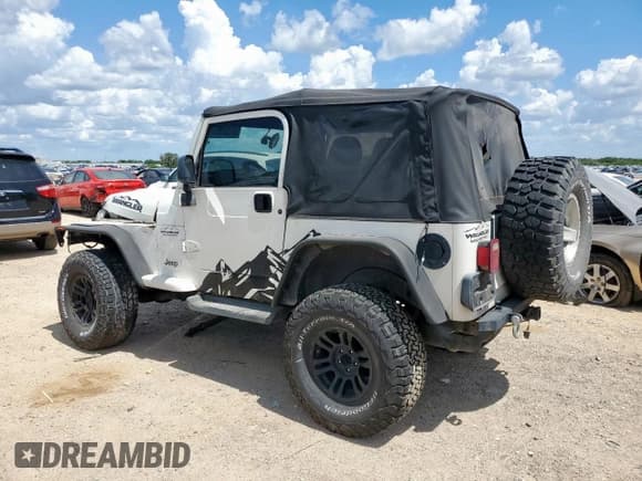 ✅ 2004 Jeep Wrangler Sport • VIN: 1J4FA49SX4P802341 • Lot: 62752565. Listed on Copart with 150,197 mi. Free auction sales archive from the USA and detailed vehicle history report at DreamBid. Image 2.