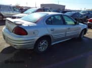✅ 2001 Pontiac Grand Am SE1 • VIN: 1G2NF52T61M574111 • Лот: 43756152. Опубликован ранее на IAAI с пробегом 159 076 миль. Бесплатный доступ к архиву аукционных продаж из США и подробный отчёт об истории автомобиля на DreamBid. Изображение 4.