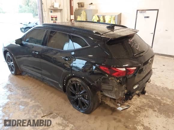 2020 Chevrolet Blazer RS z VIN 3GNKBKRS7LS654887, wystawiony jako IAAI lot #43384861 z przebiegiem 68 542 mil mil oraz . Historia ofert i sprzedaży dostępna na DreamBid. Obrazek 3.