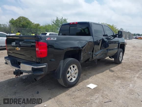 ✅ 2015 Chevrolet Silverado 2500HD LT • VIN: 1GC1KVEGXFF661574 • Lot: 42809342. Listed on IAAI with 265,001 mi. Free auction sales archive from the USA and detailed vehicle history report at DreamBid. Image 4.