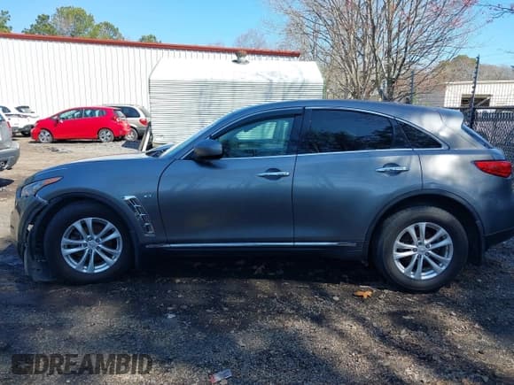 ✅ 2014 Infiniti QX70 • VIN: JN8CS1MW9EM413406 • Лот: 41909387. Опубликован ранее на IAAI с пробегом 123 957 миль. Бесплатный доступ к архиву аукционных продаж из США и подробный отчёт об истории автомобиля на DreamBid. Изображение 14.