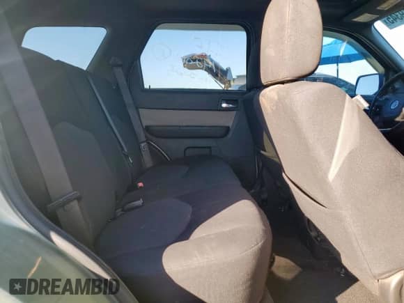 2009 Mercury Mariner с VIN 4M2CU81799KJ01514, выставлен на аукционе Copart как лот 82219345 с пробегом 392 707 миль миль и Списание • Salvage title. История ставок и продаж доступна на DreamBid. Изображение 11.