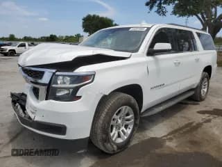 ✅ 2018 Chevrolet Suburban LS • VIN: 1GNSCGKC6JR379977 • Lot: 54351685. Listed on Copart with 138,574 mi. Free auction sales archive from the USA and detailed vehicle history report at DreamBid. Image 1.