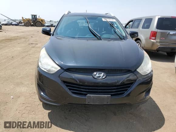 2011 Hyundai Tucson GLS z VIN KM8JUCAC9BU156922, wystawiony jako Copart lot #64274714 z przebiegiem 101 631 mil mil oraz Szkoda całkowita • Salvage title. Historia ofert i sprzedaży dostępna na DreamBid. Obrazek 5.