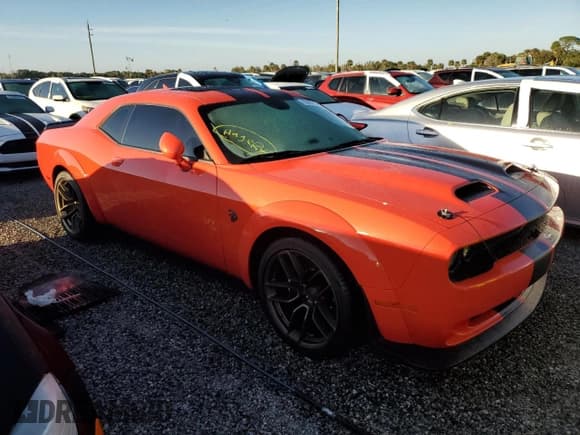 ✅ 2022 Dodge Challenger SRT Hellcat Redeye Widebody • VIN: 2C3CDZL97NH116948 • Lot: 75085104. Wystawiony na Copart z przebiegiem Nie podano. Bezpłatny archiwum sprzedaży aukcyjnych z USA i szczegółowy raport historii pojazdu na DreamBid. Zdjęcie 4.
