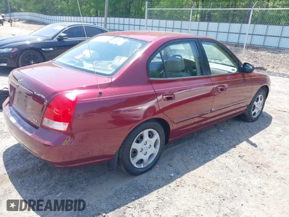 ✅ 2001 Hyundai Elantra GLS • VIN: KMHDN45D61U237040 • Lot: 42064257. Wystawiony na IAAI z przebiegiem 262 040 mil. Bezpłatny archiwum sprzedaży aukcyjnych z USA i szczegółowy raport historii pojazdu na DreamBid. Zdjęcie 4.