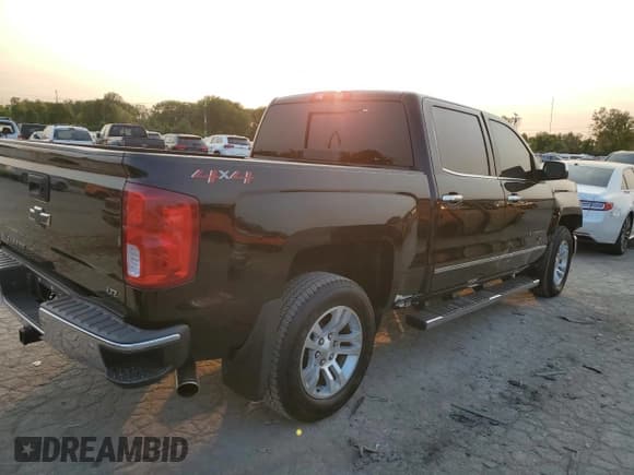✅ 2018 Chevrolet Silverado 1500 LTZ • VIN: 3GCUKSEC6JG551749 • Лот: 70435974. Опубликован ранее на Copart с пробегом 151 536 миль. Бесплатный доступ к архиву аукционных продаж из США и подробный отчёт об истории автомобиля на DreamBid. Изображение 3.
