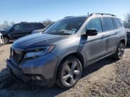 ✅ 2021 Honda Passport Touring • VIN: 5FNYF8H97MB018330 • Lot: 46048155. Listed on Copart with 80,051 mi. Free auction sales archive from the USA and detailed vehicle history report at DreamBid. Image 1.