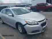 2016 Chevrolet Malibu LT z VIN 1G11C5SA5GF156985, wystawiony jako IAAI lot #42944353 z przebiegiem 159 538 mil mil oraz . Historia ofert i sprzedaży dostępna na DreamBid. Obrazek 1.