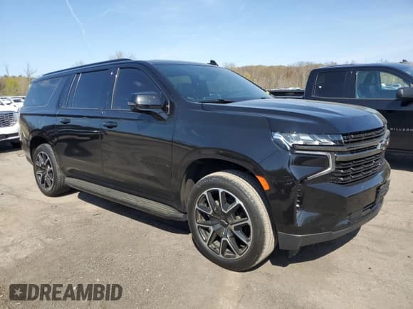 ✅ 2021 Chevrolet Suburban RST • VIN: 1GNSKEKD7MR219076 • Lot: 54423625. Listed on Copart with 60,601 mi. Free auction sales archive from the USA and detailed vehicle history report at DreamBid. Image 4.